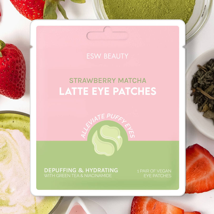 Strawberry Matcha Latte Eye Patches packaging with strawberries and green tea leaves on a white background