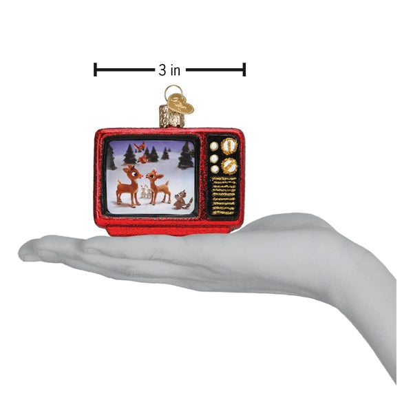 Vintage-style television ornament with Christmas scene on a white background