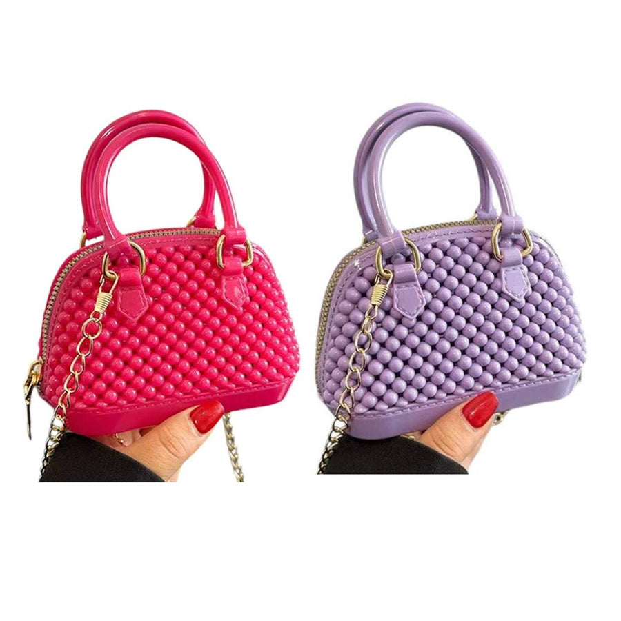 mini jelly bubble bowler crossbody bag in both deep pink and purple. 
