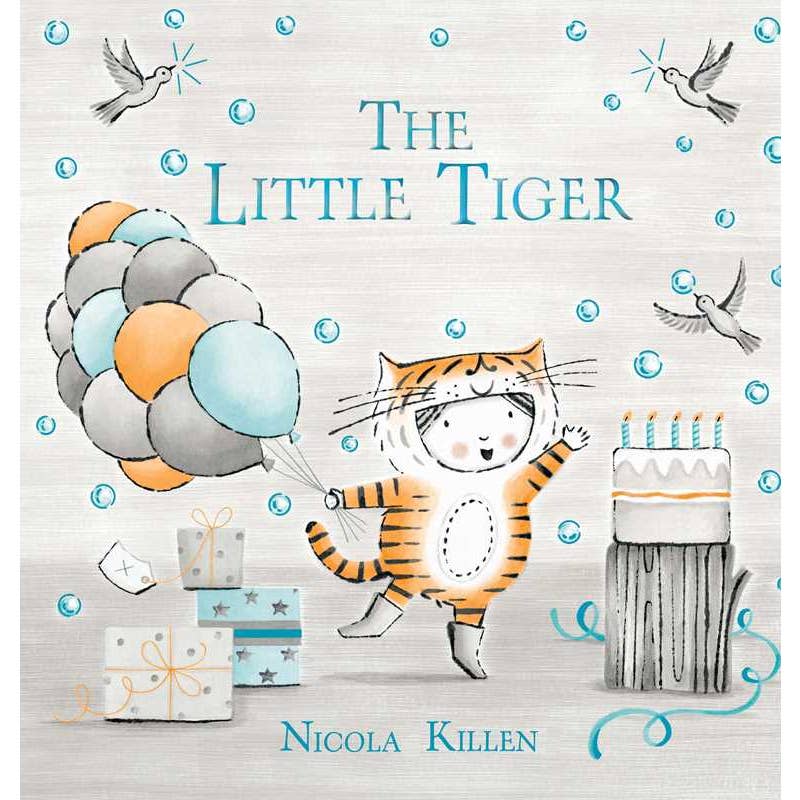 hardcover book called The Little Tiger, a child dressed as a tiger on the cover holding balloons. 