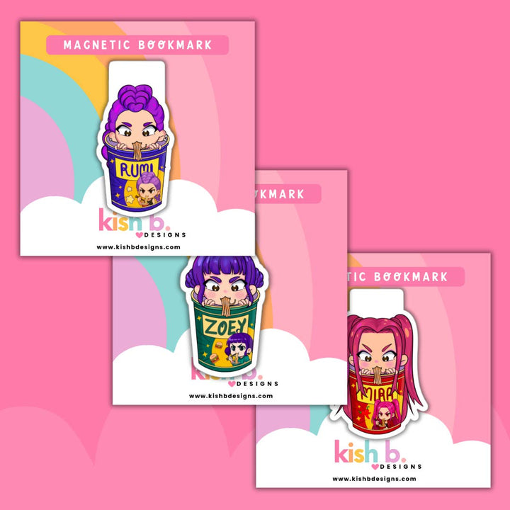Set of colorful magnetic bookmarks with cartoon characters on a pink background