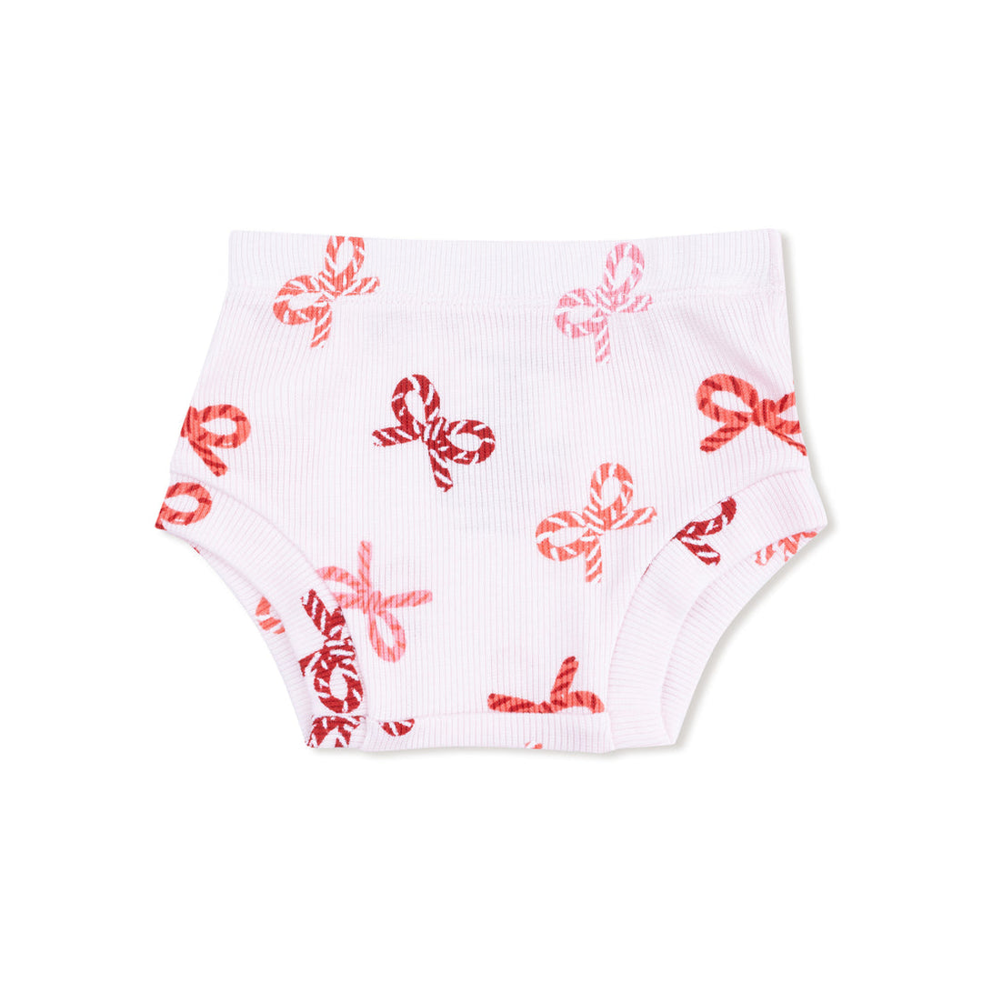 White baby bloomers with red candy cane bow pattern on a white background
