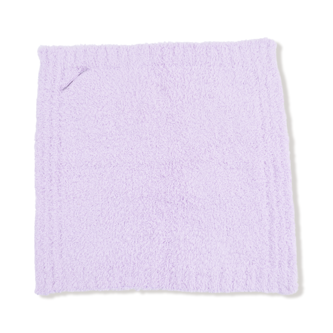 Light purple blanket on a white background
