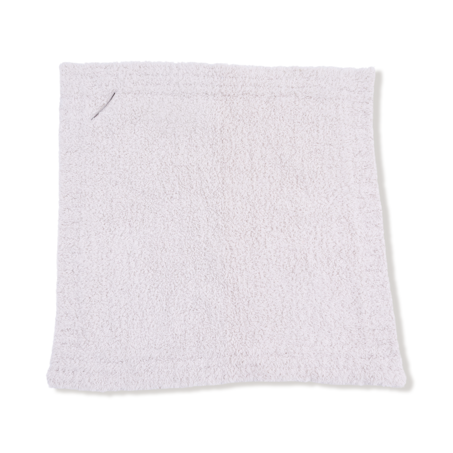 White textured blanket on a white background