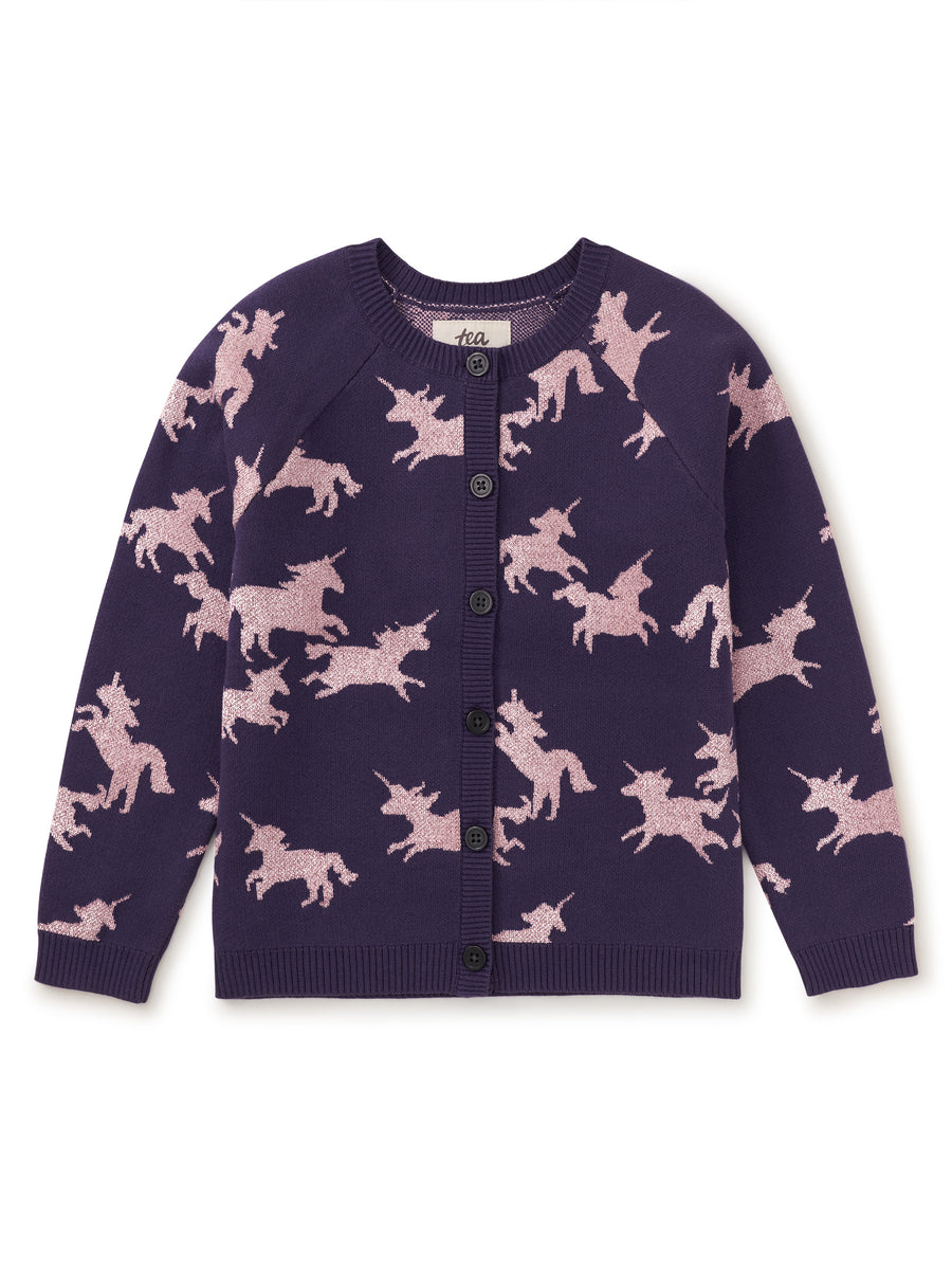 Purple cardigan with pink unicorn pattern on a white background