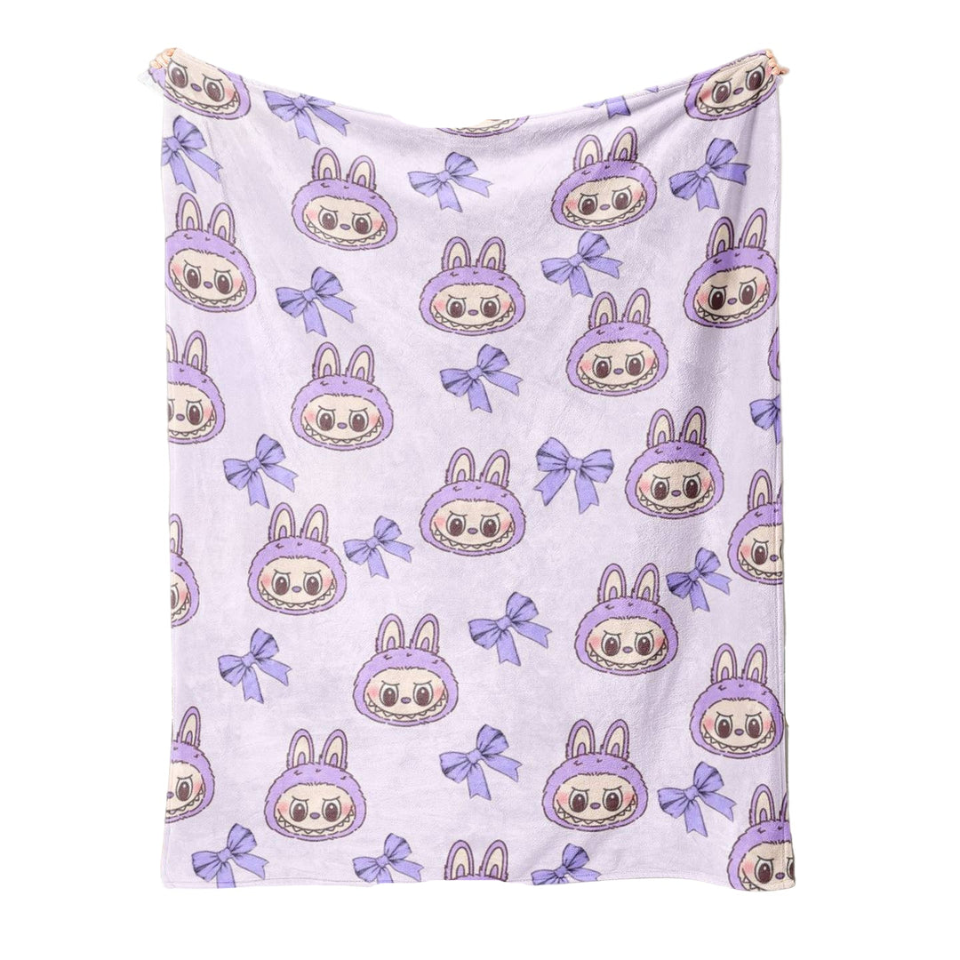  a blanket with a labubu cartoon character pattern and purple bows
