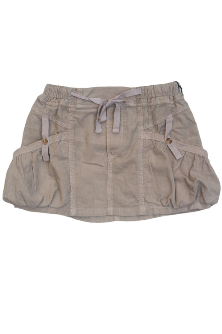 Beige skirt with multiple pockets on a white background