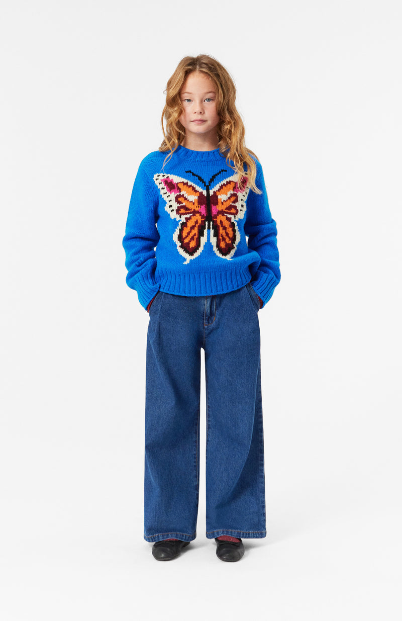 Girl wearing Gulda Butterfly Knit Blue Sweater from Molo