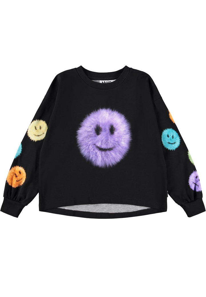 A black long-sleeve tshirtt- featuring a large, fuzzy purple smiley face on the front and smaller colorful smiley faces printed along both sleeves.