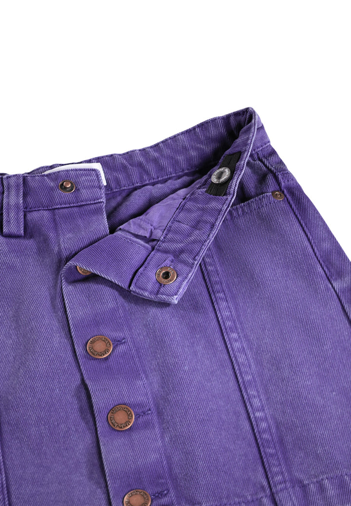 Close-up of a purple denim skirt with button details on a white background