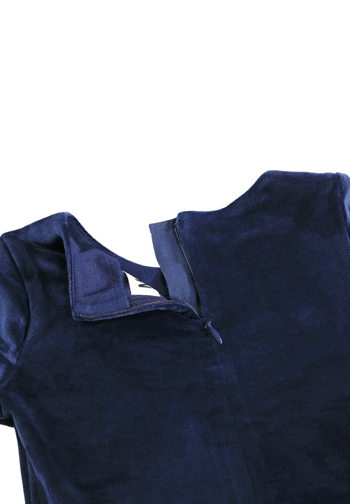 Close-up of a dark navy blue velvet garment, showing the collar and upper chest area against a plain white background.