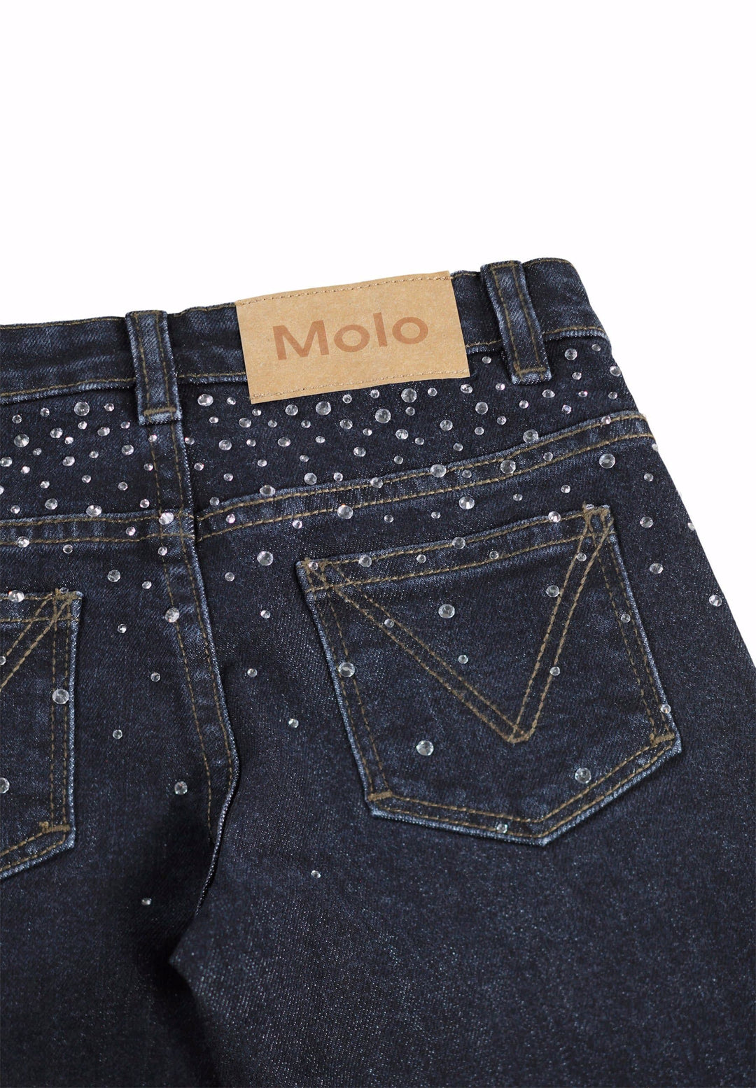 Dark blue jeans with rhinestone embellishments and Molo brand label on a white background