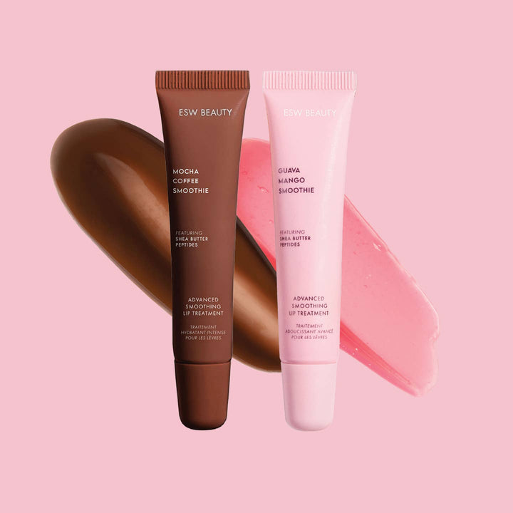 Two lip treatment tubes, one brown and one pink, on a pink background with visible brand names.