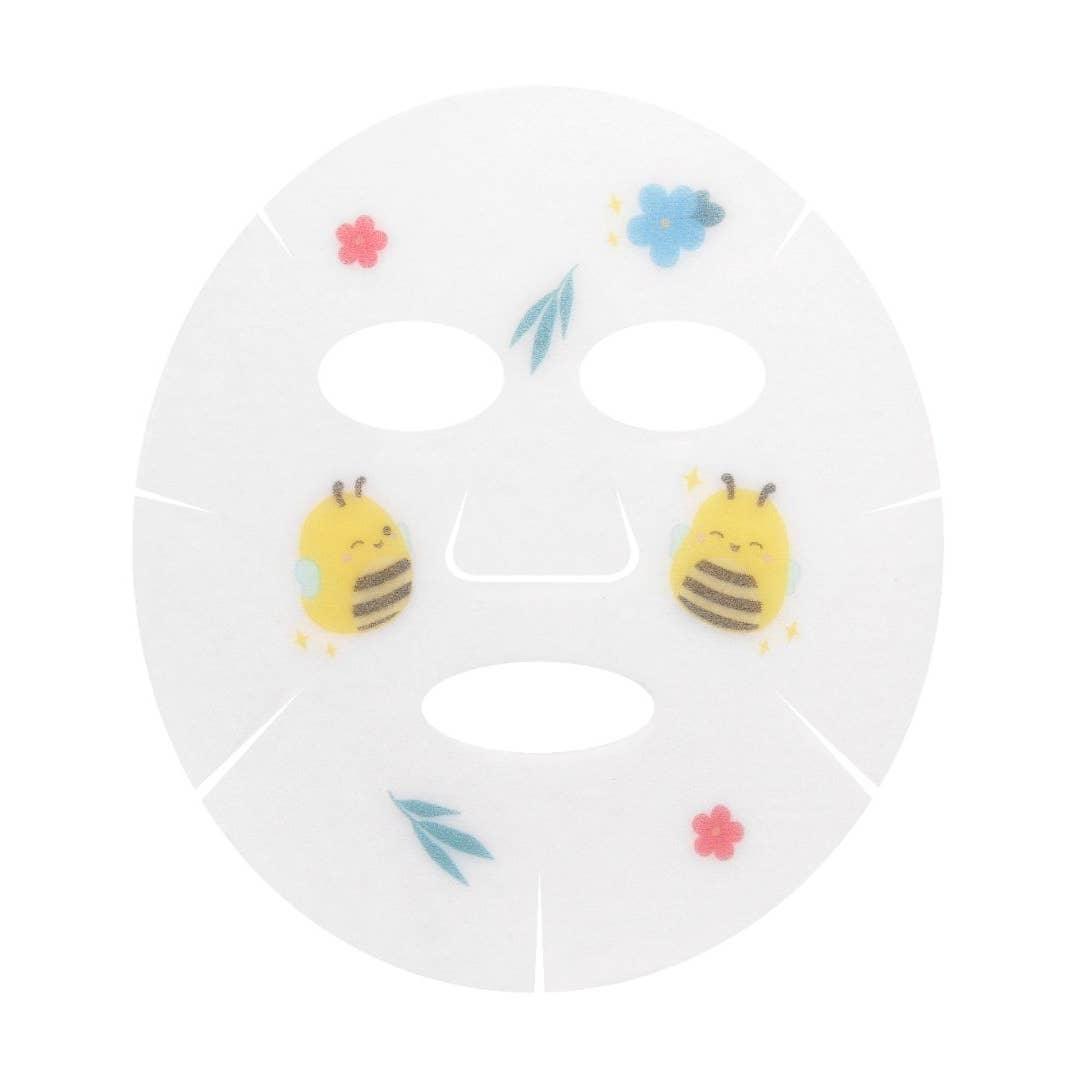 the actual face mask, has some small flowers and Sunny the bumble bee printed on it. 