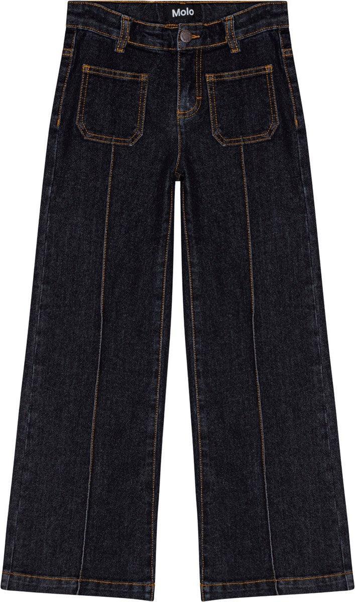 Adina Raw Blue Denim Pant from Molo featuring trumpet silhouette 70s style with stitch detailing in seaming and around pockets.