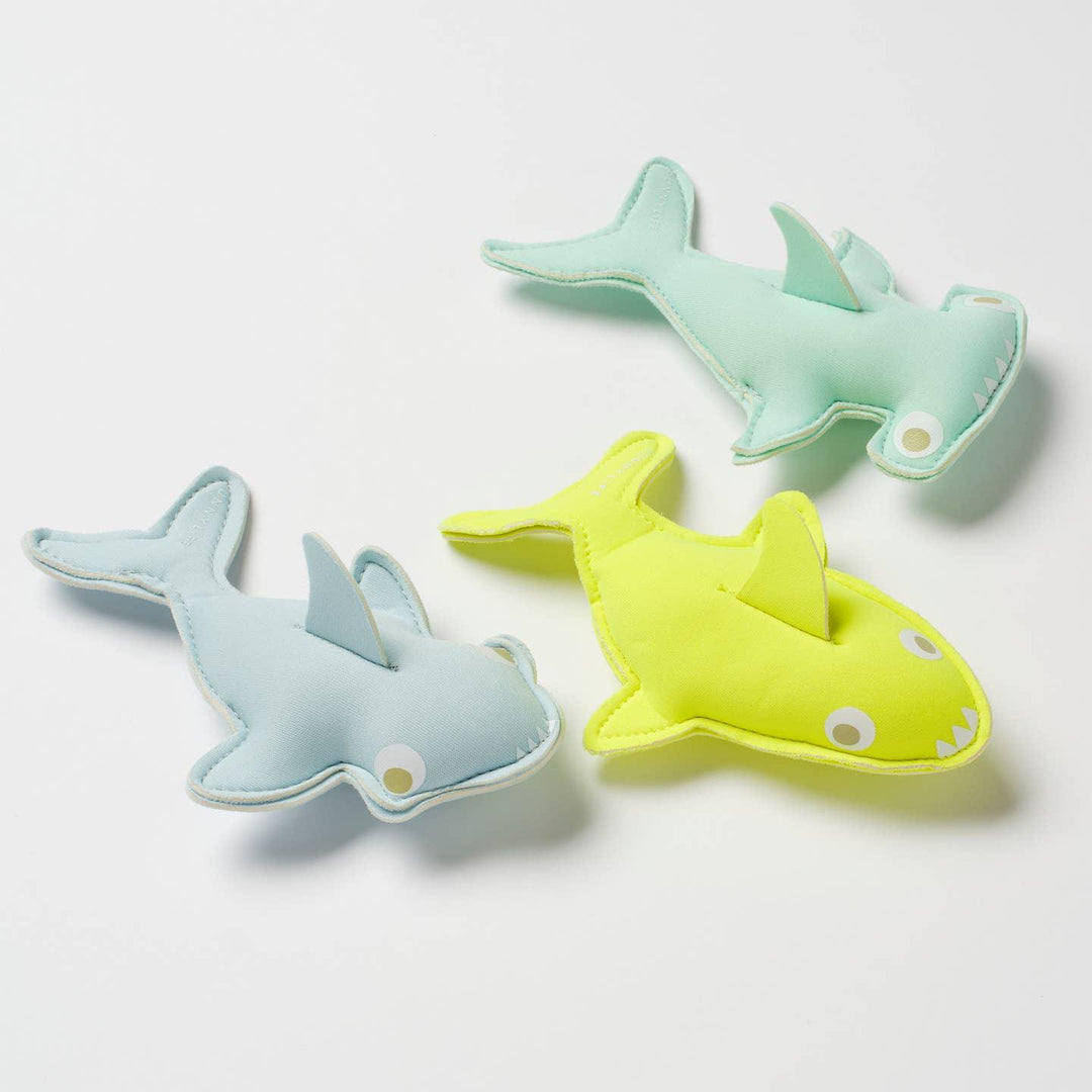 3 different sharks for the water: neon yellow, blue and green. all different sharks. 