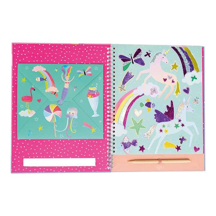 inside pages of the raft book with unicorns and rainbows. shows how the foil accents the pictures. 