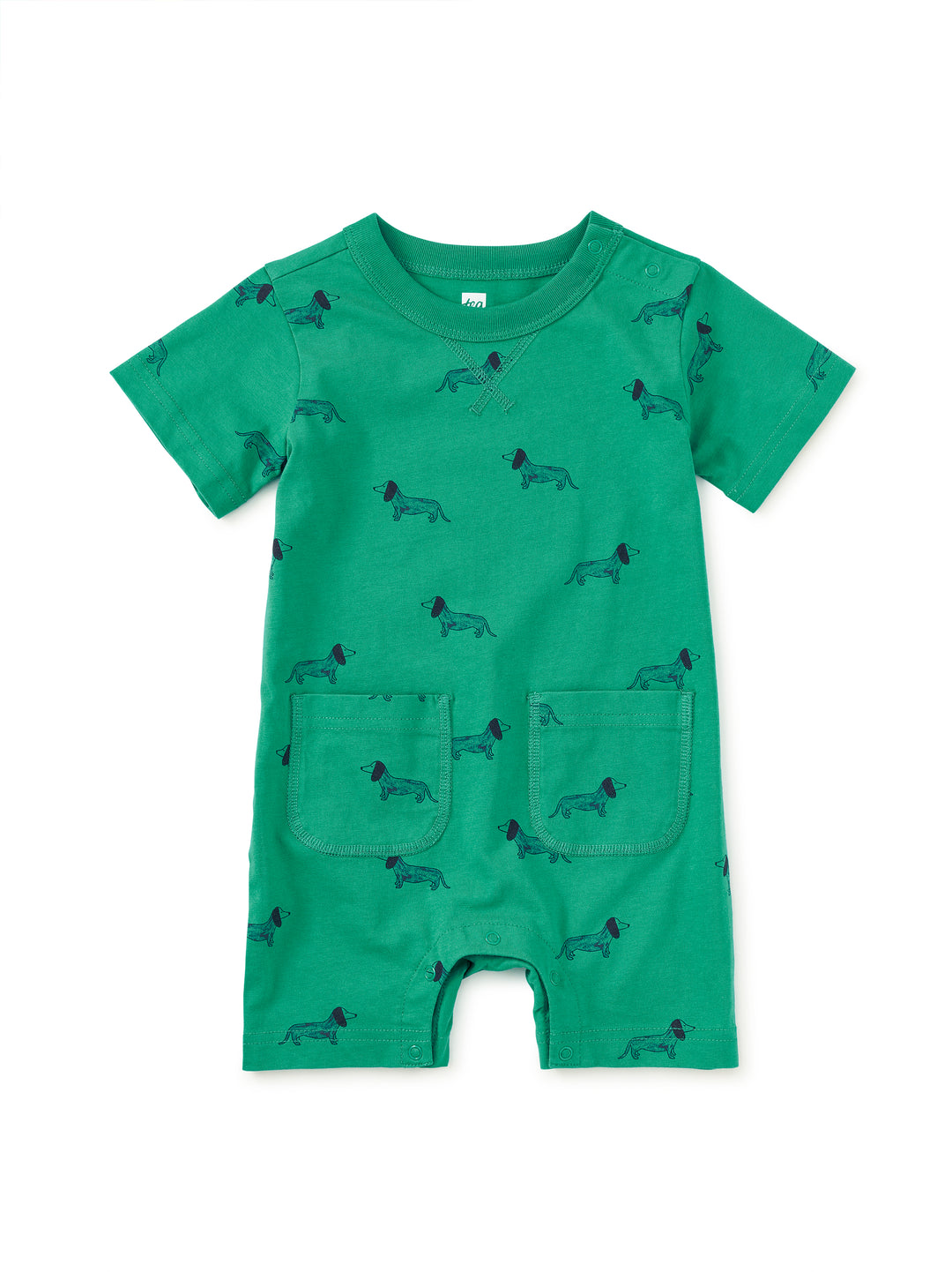 Green romper with dog pattern on a white background