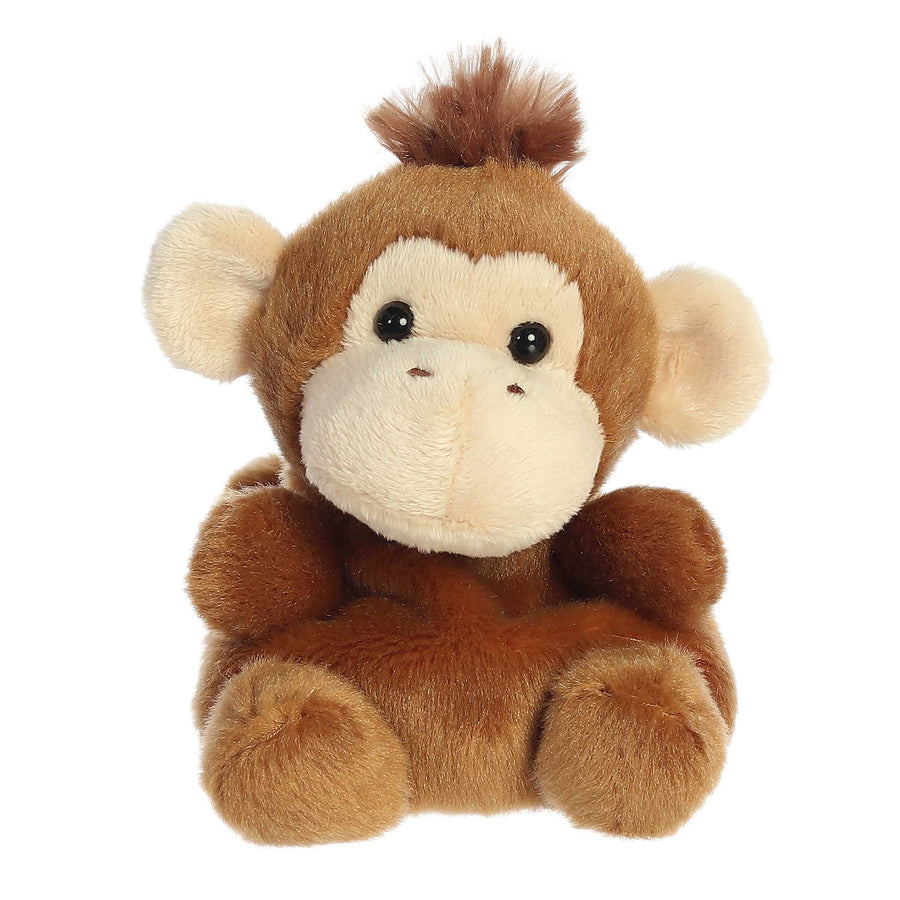 Plush monkey toy on a white background