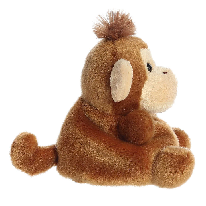 Plush monkey toy on a white background
