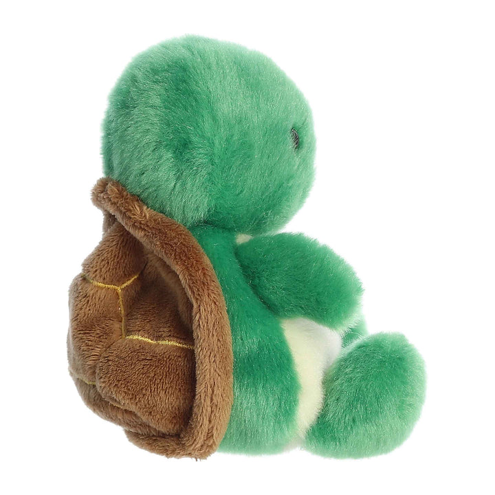 Green plush turtle with a brown shell on a white background