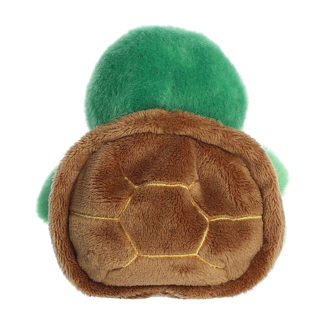 Plush turtle toy with green head and brown shell on a white background