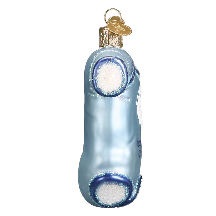 Glass ornament shaped like a bottle with a blue and white design on a white background