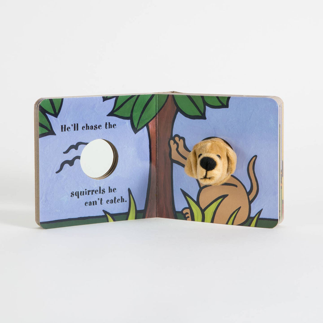 Children's book with a dog and tree illustration on a white background