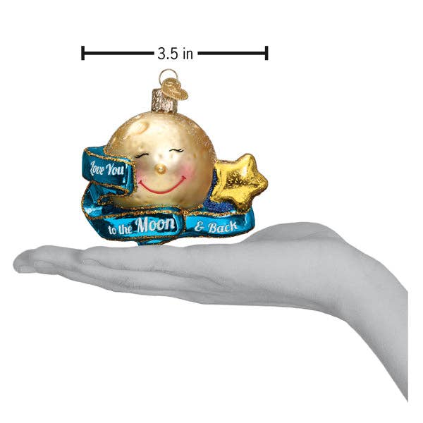 Decorative moon ornament with a smile and 'I love you to the moon and back' text, held in a hand for scale.