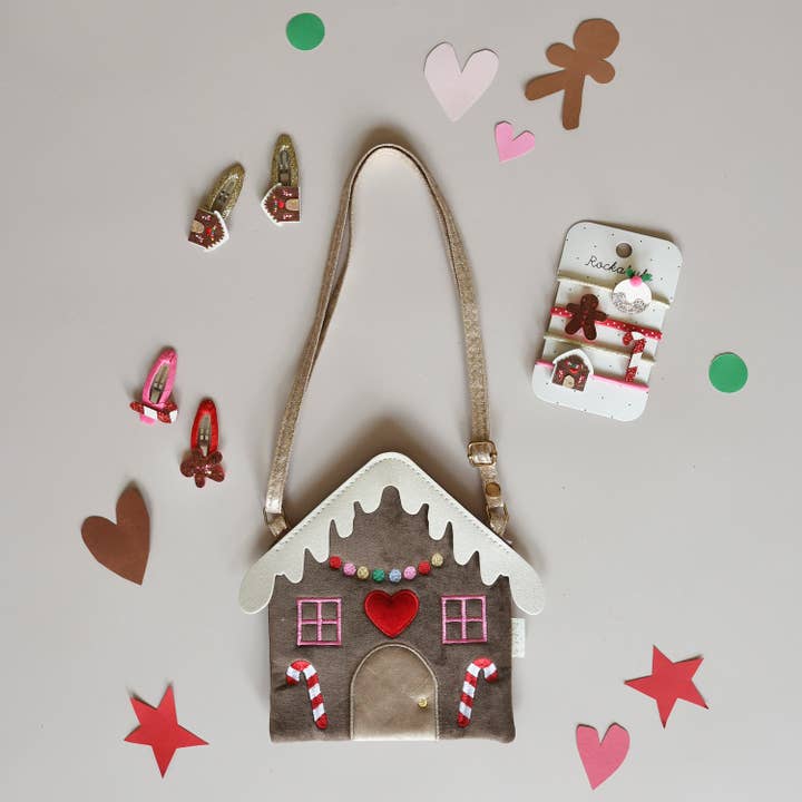 gingerbread house handbag, gingerbread person, candy cane clips and gingerbread house clips. 