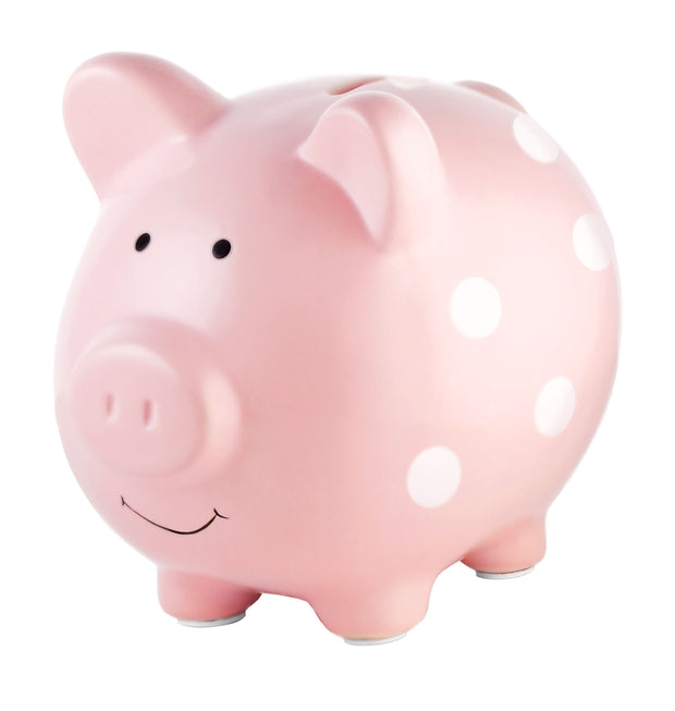 piggy bank that is pink with white polka dots all over 