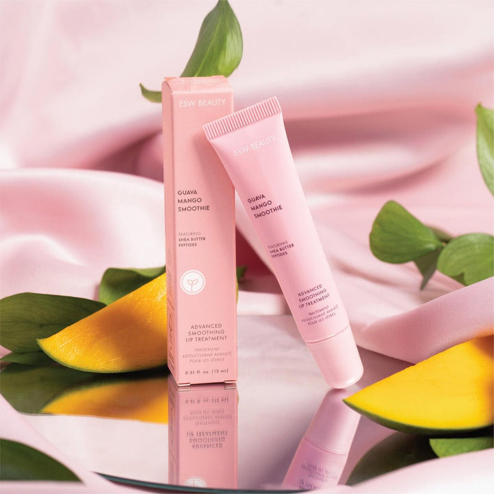 branded shot with box and lip balm tube. both the box and tube are pink