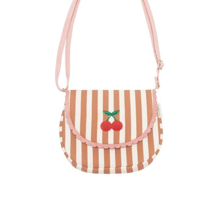 burnt orange striped crossbody bag with light pink crossbody strap and emrbroidered cherries on the flap