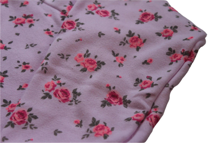 another close up of the pink sweatshirt with tiny hot pink roses on it. 