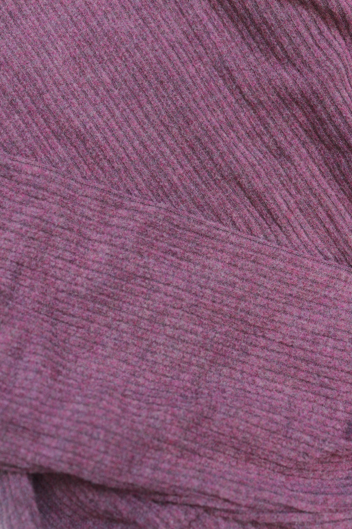 Close-up of a textured purple fabric