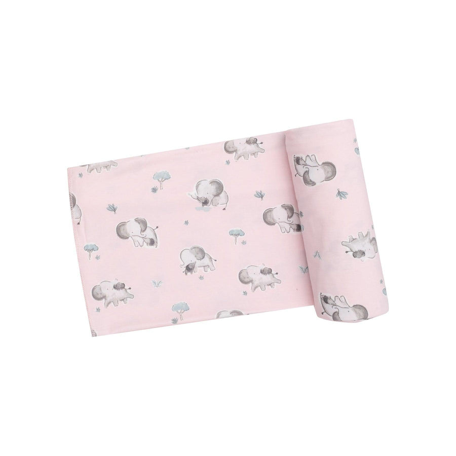 light pink baby swaddle with gray baby elephants all over it. 
