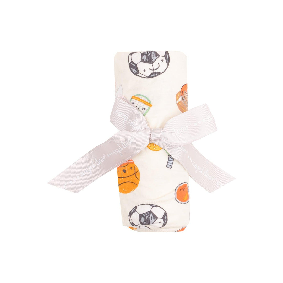 sports balls friends swaddle rolled up and tied with a ribbon. this is the packaging it gets sold in. 