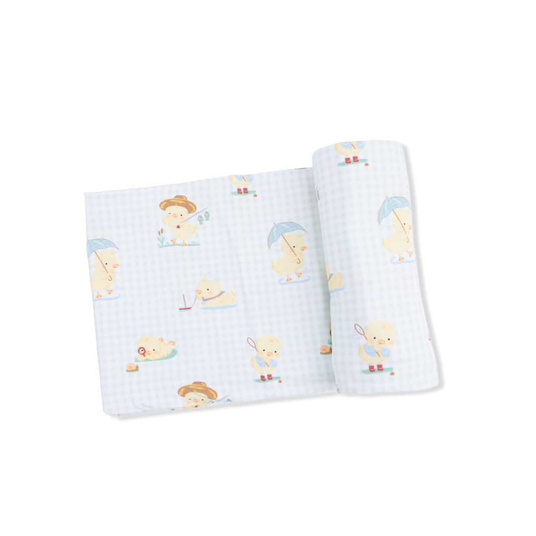 baby blankets with cartoon  chick designs on a white background