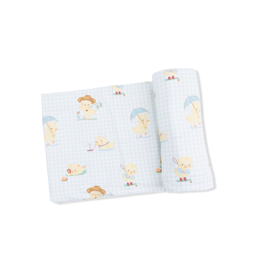 baby blankets with cartoon  chick designs on a white background