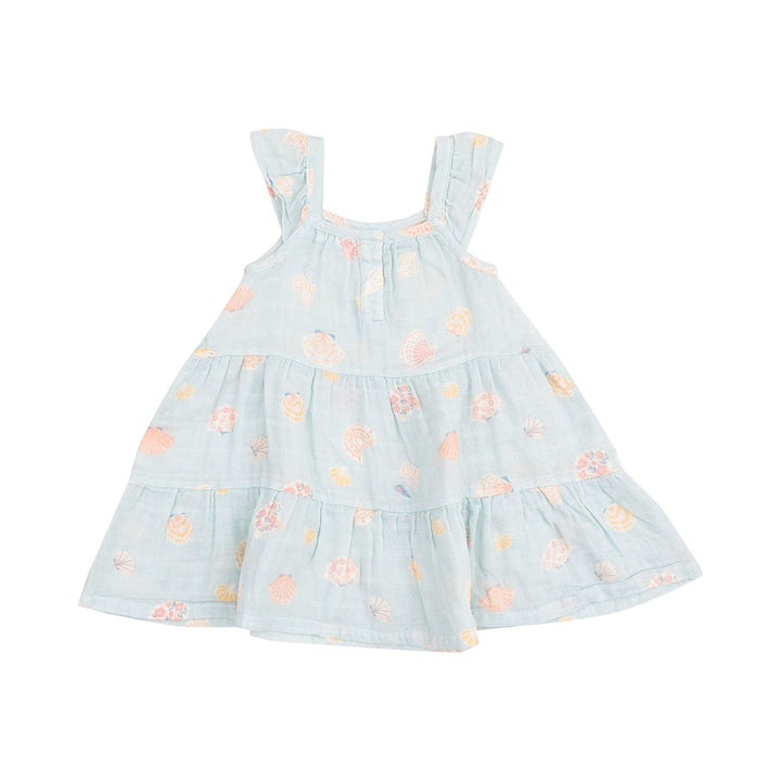 back of dress with 3 snaps at the top of the neck slight ruffle on the sleeves. A-line dress. ice blue with beige/peach seashells all over. 