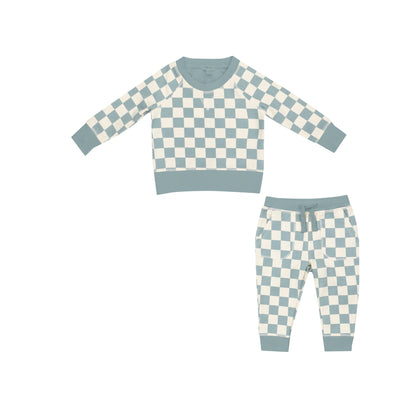 teal gray checkerboard outfit, sweatshirt and jogger set.  checks all over the joggers and sweatshirt. 