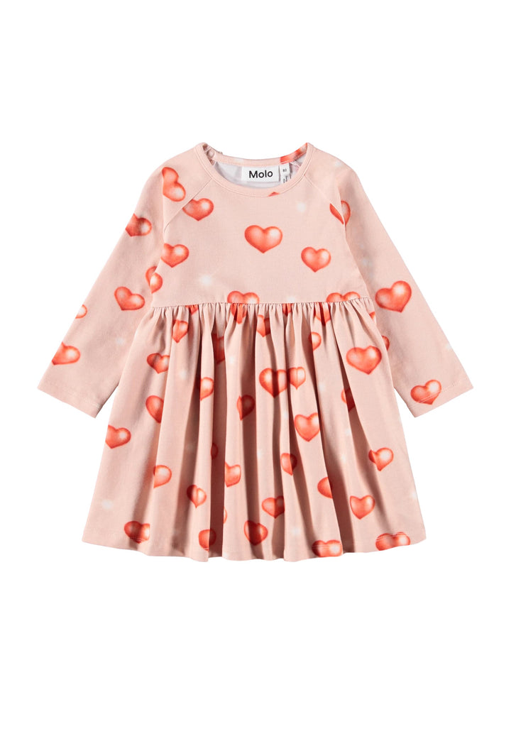 Pink dress with red heart patterns on a white background