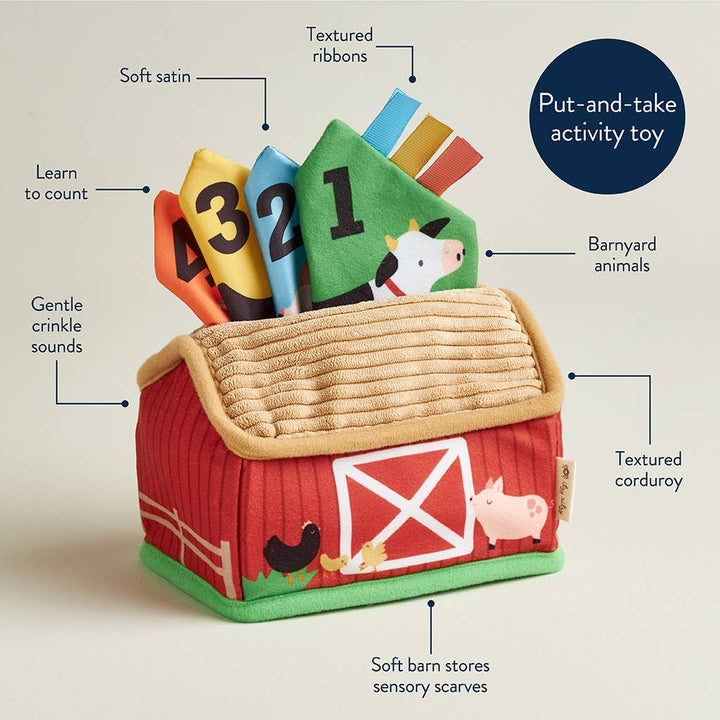 Children's barn toy with educational elements on a beige background