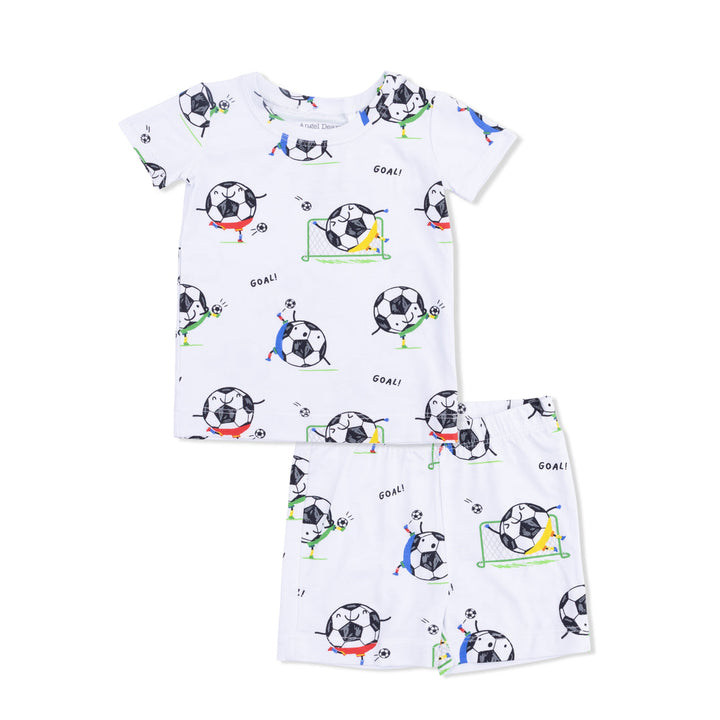 Children's pajama set with soccer ball pattern on a white background