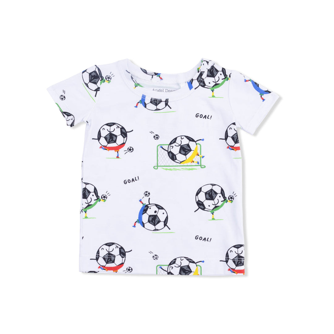 Children's t-shirt with soccer ball and dog print on a white background