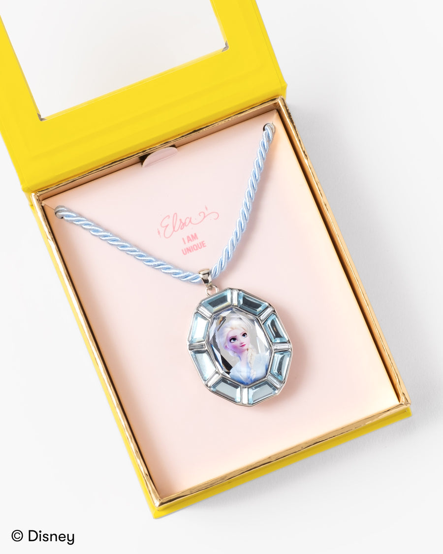 Necklace with pendant in a yellow box, featuring a Disney character.