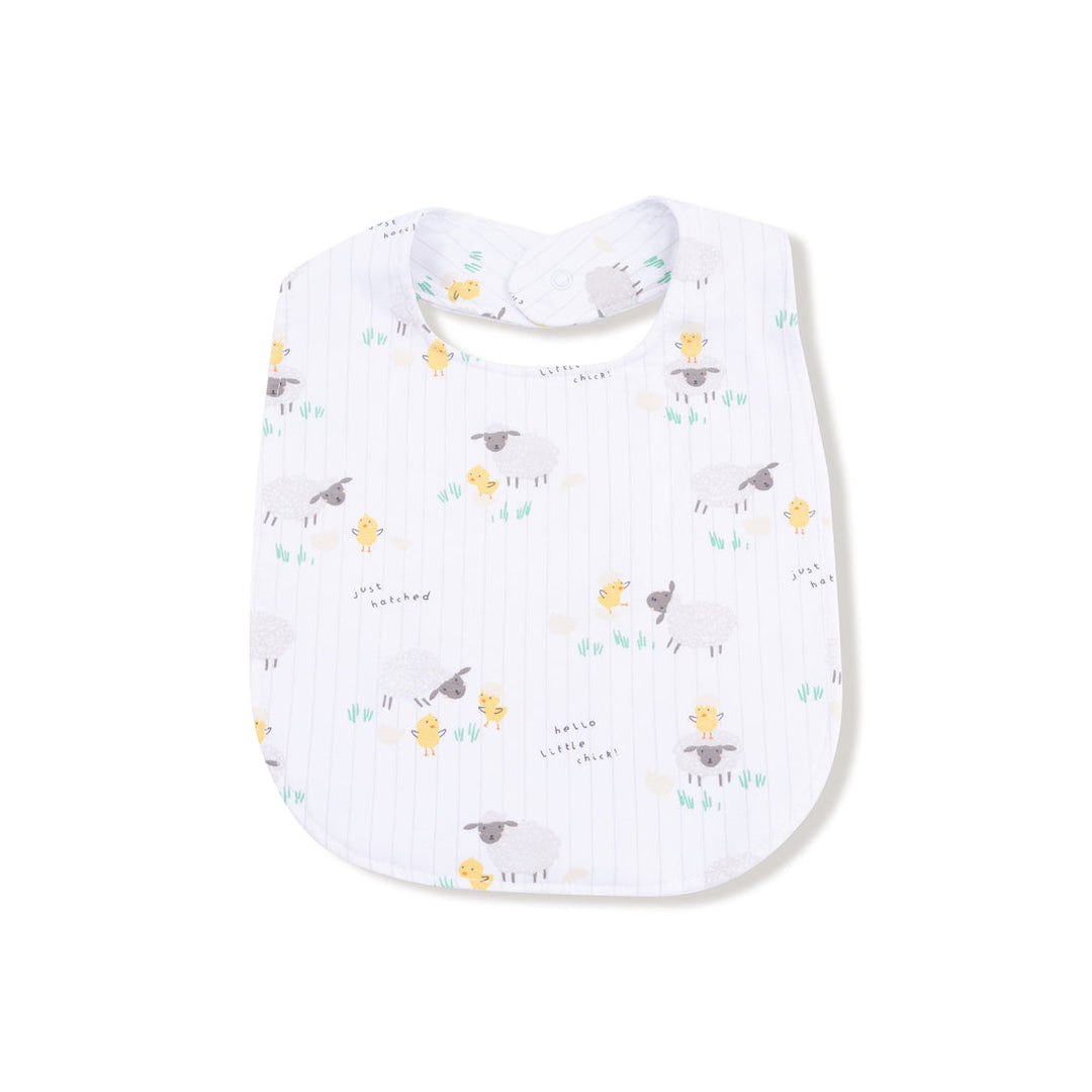 Baby bib with chick and lamb pattern on a white background
