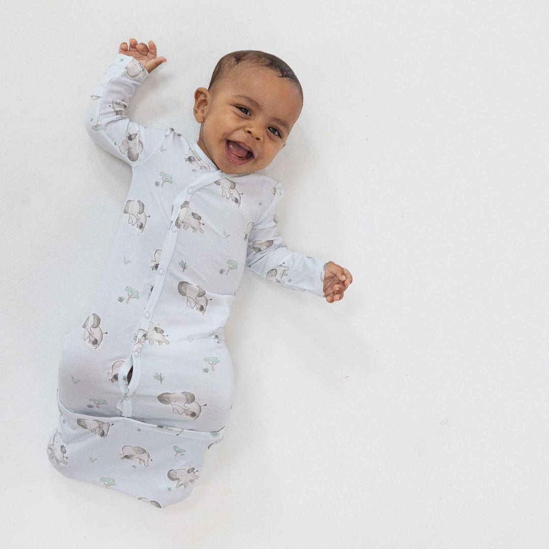 baby modeling the elephant bundle gown