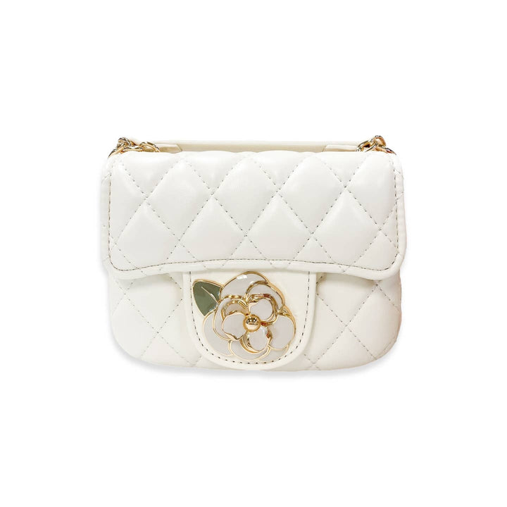 White quilted handbag with gold accents on a white background