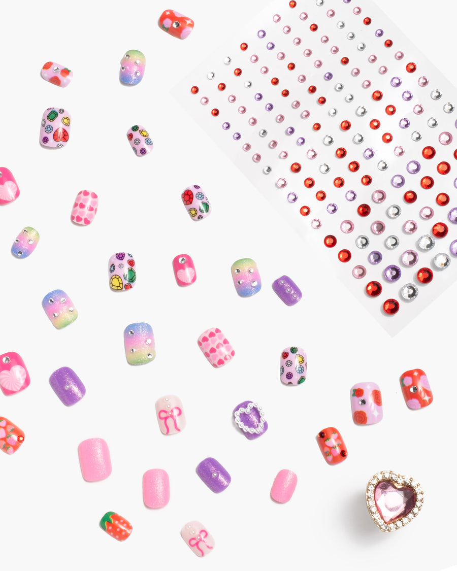 Colorful nail art decorations on a white background